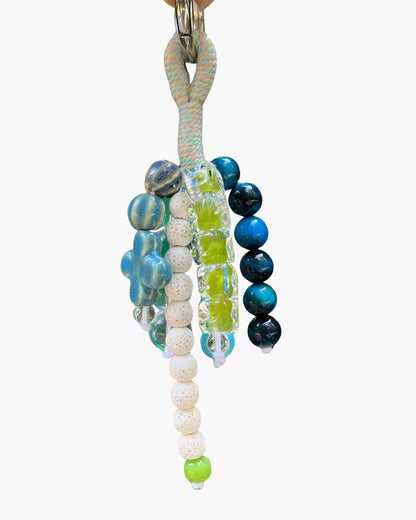 Colorful beaded keychain with a white background