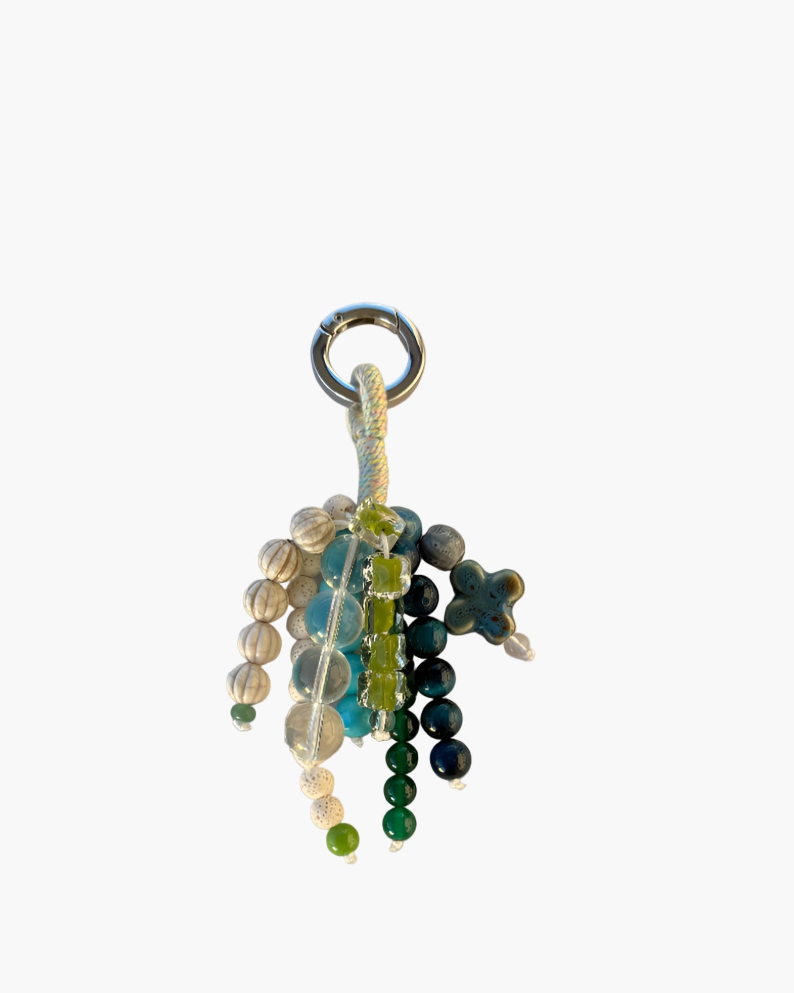 Multicolored beaded charm on a white background